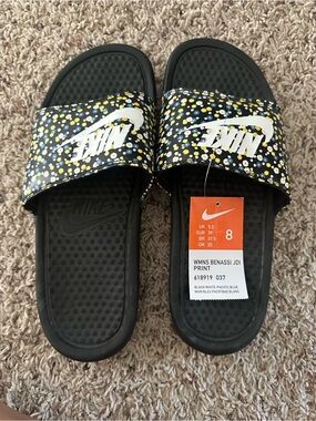 Nike Women's Black Floral Slide Sandals with White Logo